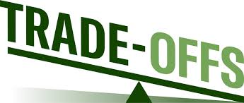 a simple balancing scale with the words trade offs written across